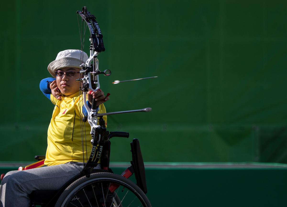 Xinliang Ai CHN competing against Turkey in the Mixed Team Compound Open Archery semi-final match at the Sambodromo