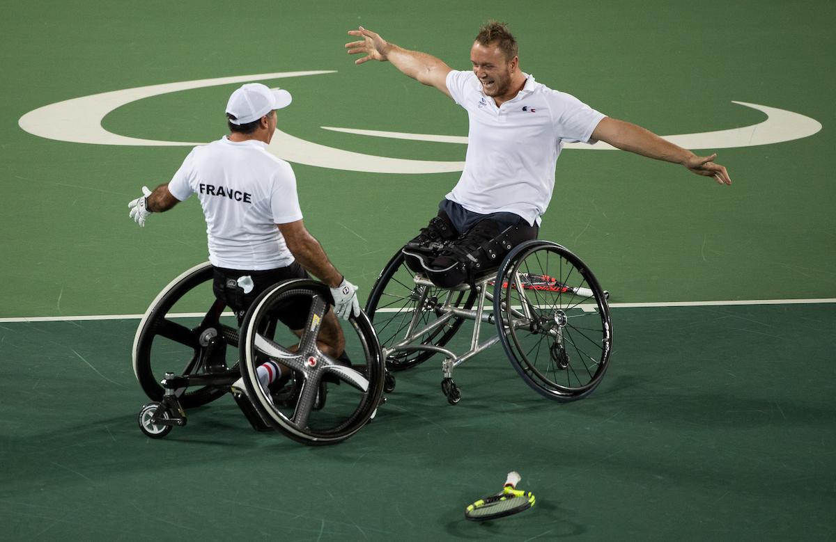 Stephane Houdet FRA (left) and Nicolas Peifer FRA celebrate as they win the Gold Medal Match against Alfie Hewett GBR and Gordon Reid GBR in the Men's Doubles Gold Medal Match