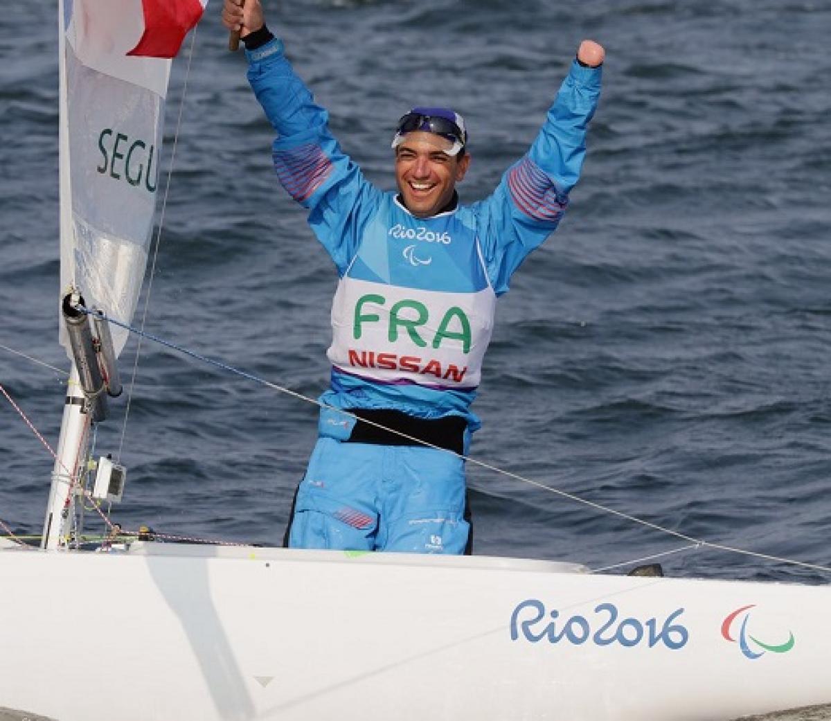 Damien Seguin celebrates winning sailing gold in Rio de Janeiro