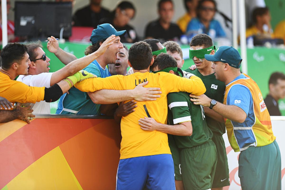 Ricardinho of Brazil and his team mates celebrate after scoring a goal in the men's football 5-a-side