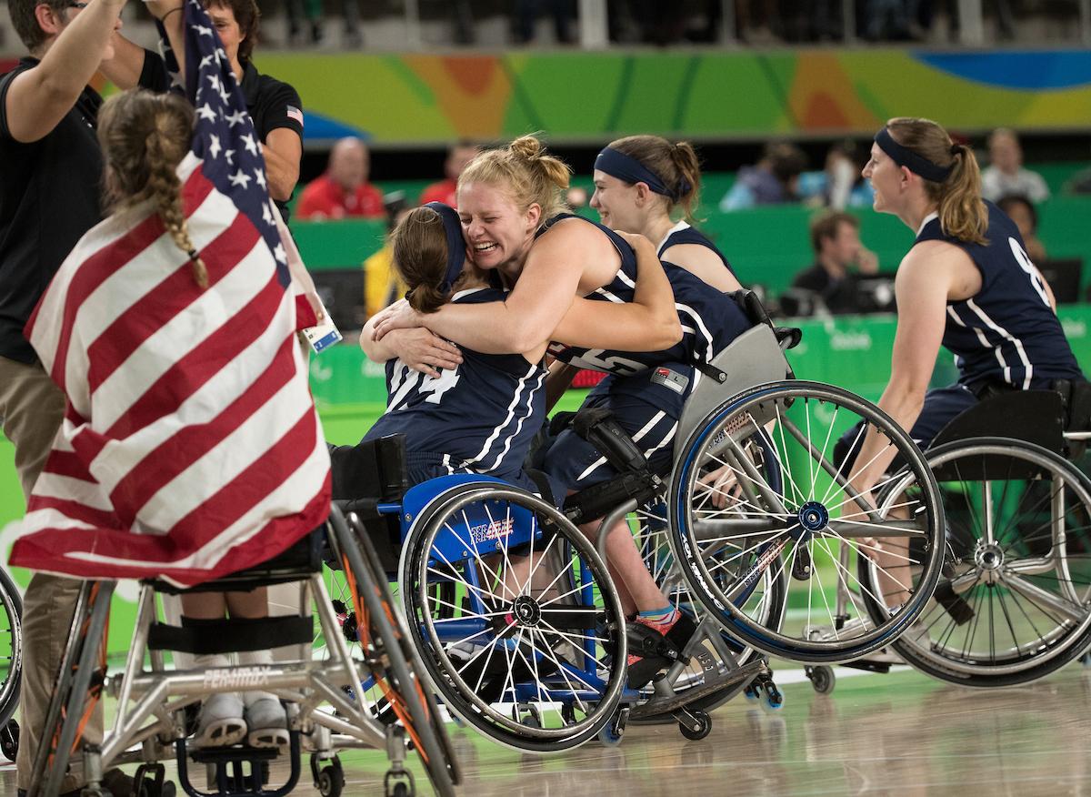 Christina Schwab USA (centre left) and Rose Hollermann USA (centre right) celebrate their team's victory 62 - 45 over Germany in the Wheelchair Basketball Women's Gold Medal Match