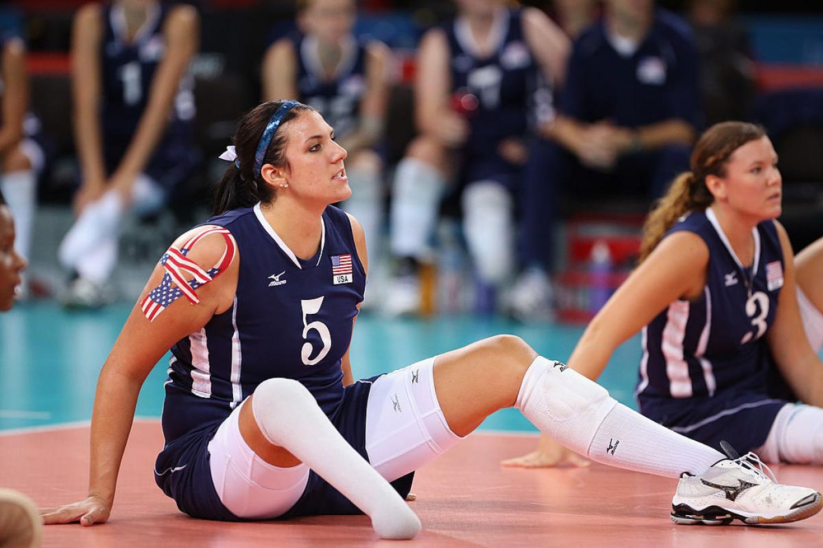 Katie Holloway - USA - sitting volleyball Woman sitting on a volleyball court