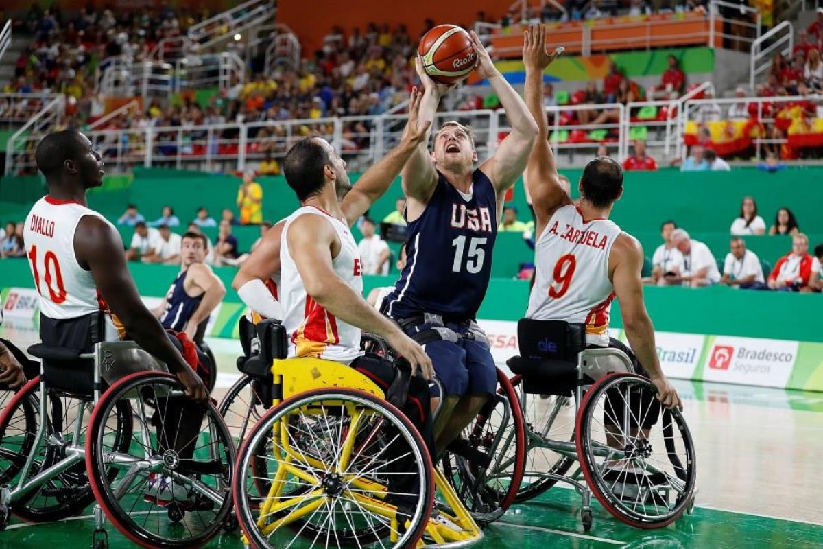 Athlete practicing wheelchair basketball.