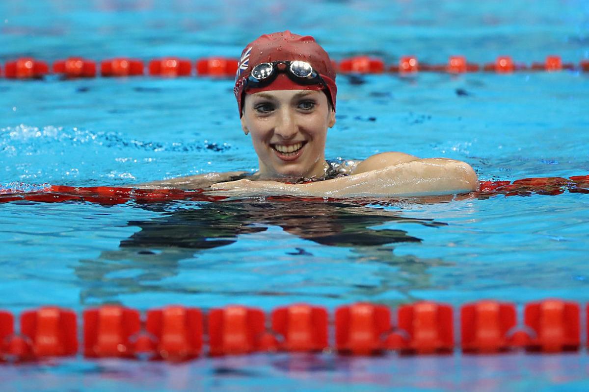 Bethany Firth of Great Britain celebrates winning the gold medal in the Women's 100m Backstroke - S14 Final at the Rio 2016 Paralympic Games.