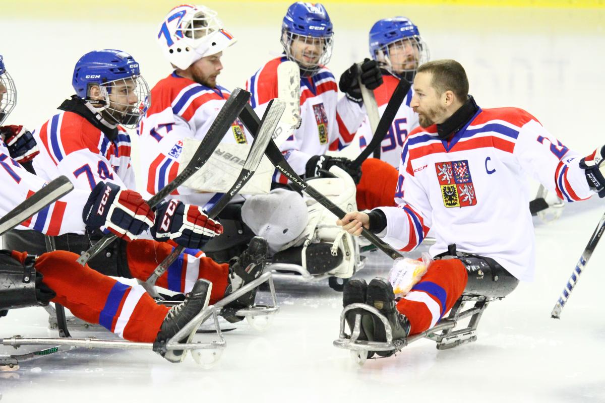 Sledge hockey players on the ice