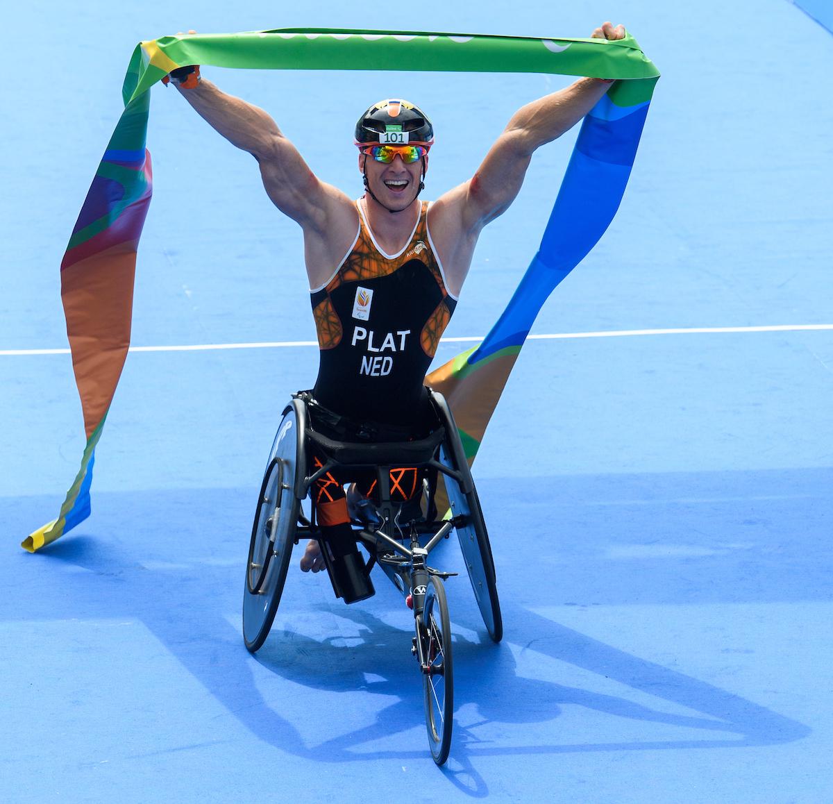 Jetze Plat NED celebrates winning the Gold Medal in the Men's PT1 Triathlon at Fort Copacabana. The Paralympic Games, Rio de Janeiro