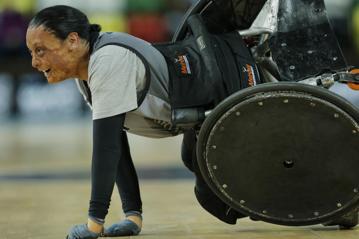 Maia Amai - wheelchair rugby Maia Amai of New Zealand (probably the strongest female player in the game) smiles after being knocked over during a match