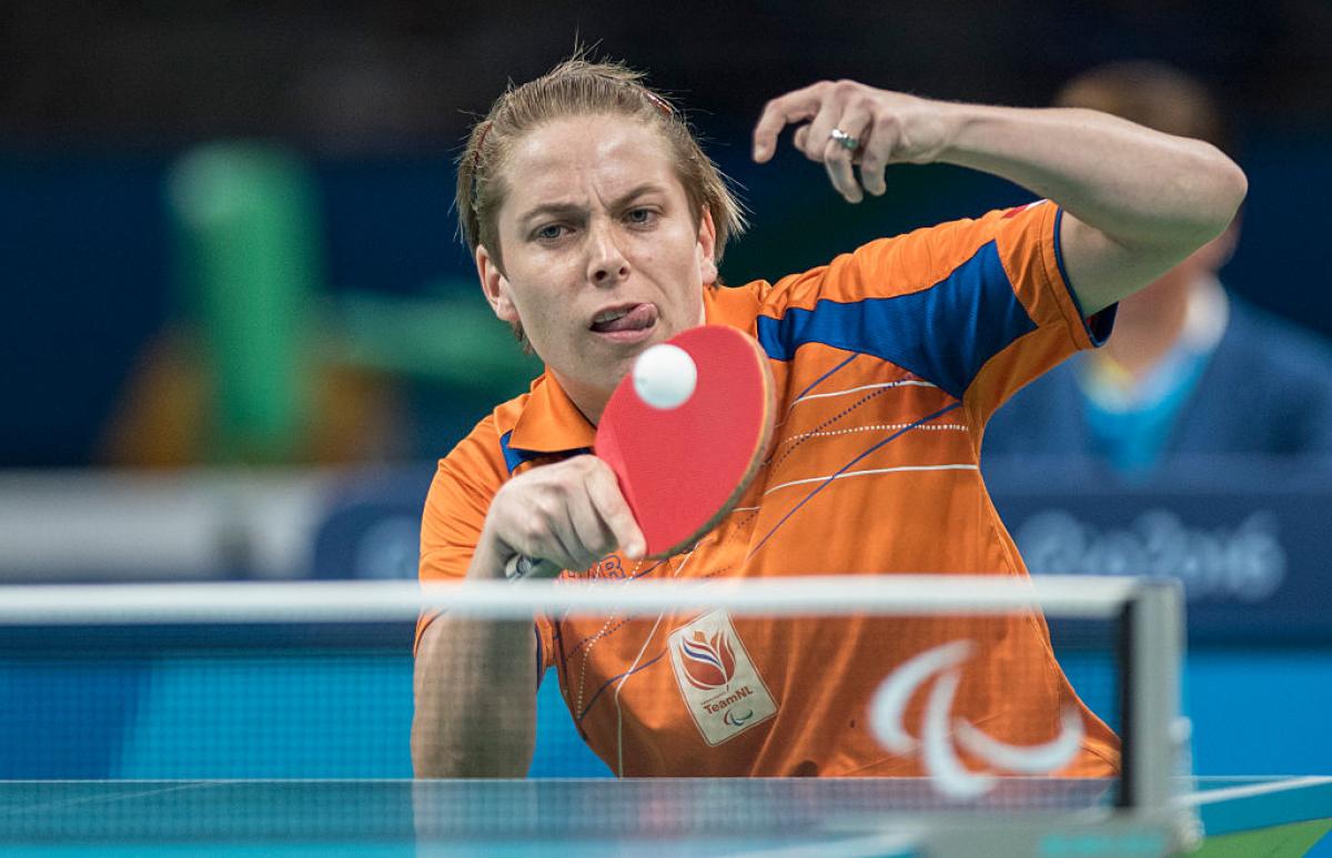 Dutch table tennis player playing the ball