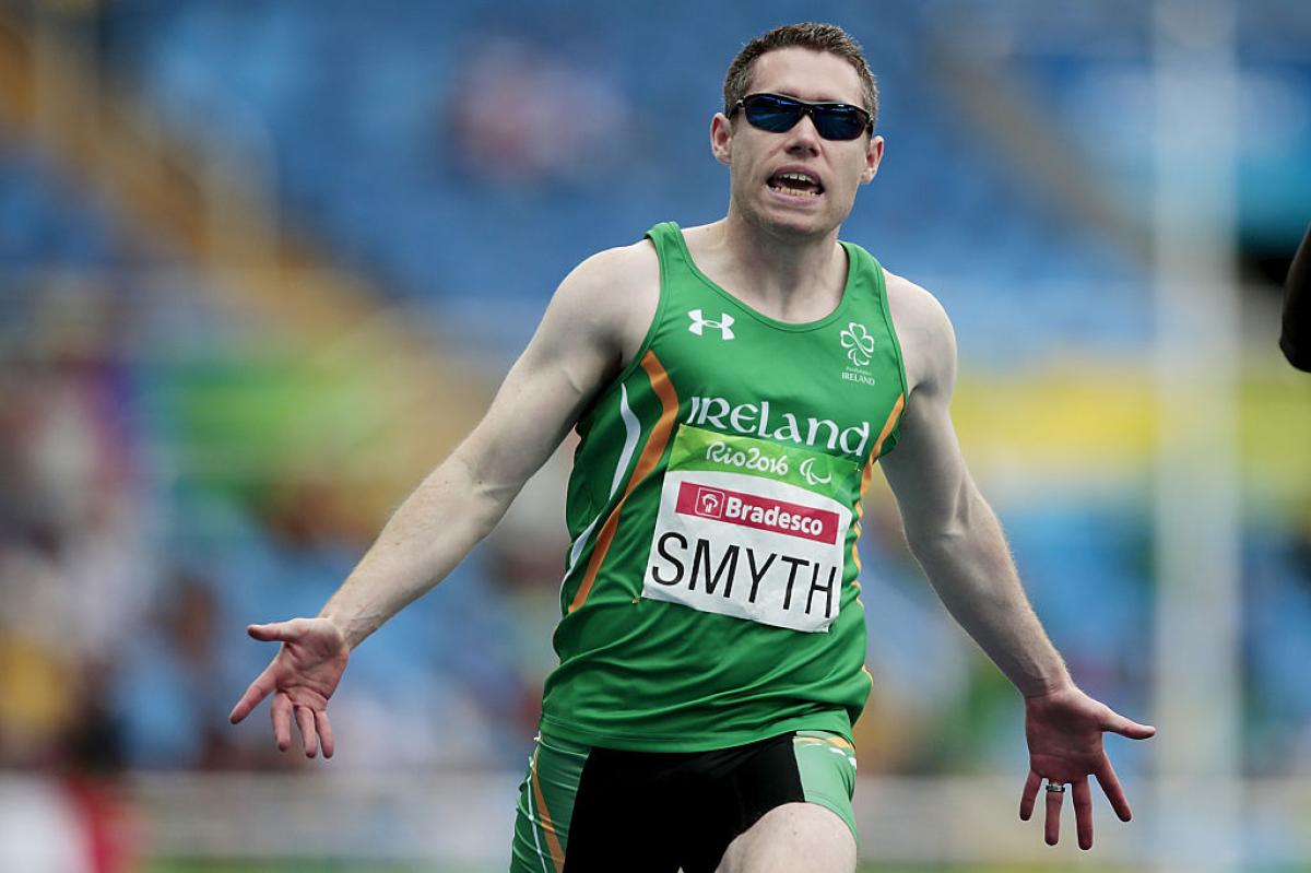 Jason Smyth of Ireland celebrates after winning the Men's 100m - T13 Final at the Olympic Stadium on Day 2 of the Rio 2016 Paralympic Games