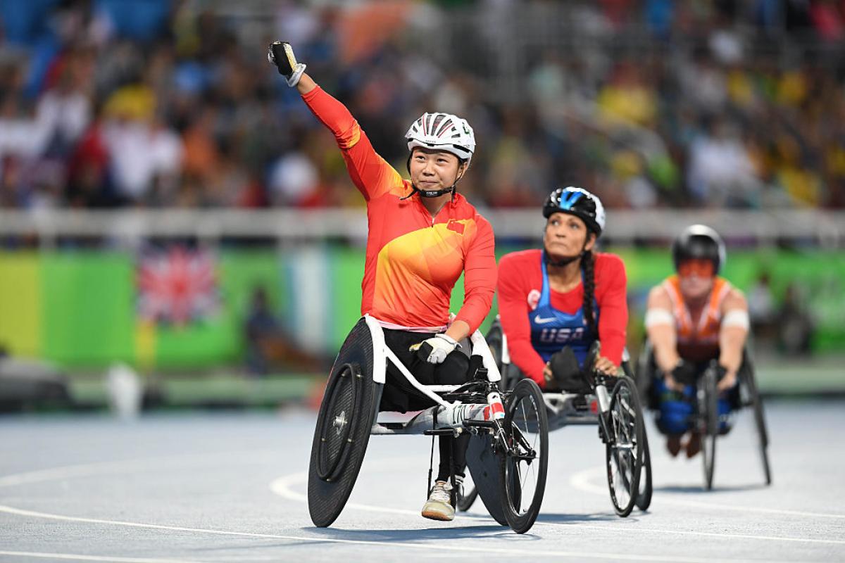 Wenjun Liu of China celebrates after winning the women's 100m - T54 final on day 2 of the Rio 2016 Paralympic Games