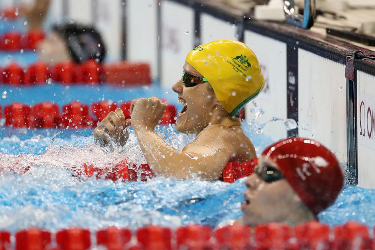Ellie Cole of Australia celebrates winning the gold medal in the Women's 100m Backstroke - S9 Final on day 9 of the Rio 2016 Paralympic Games