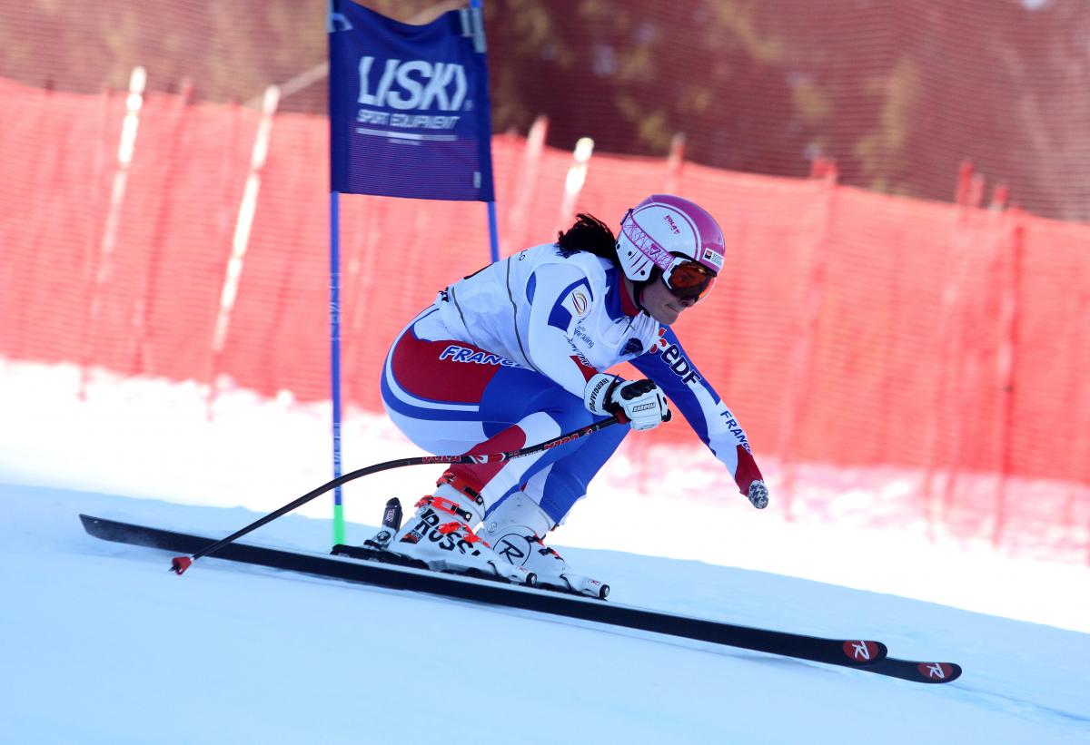 A skier competes in downhill