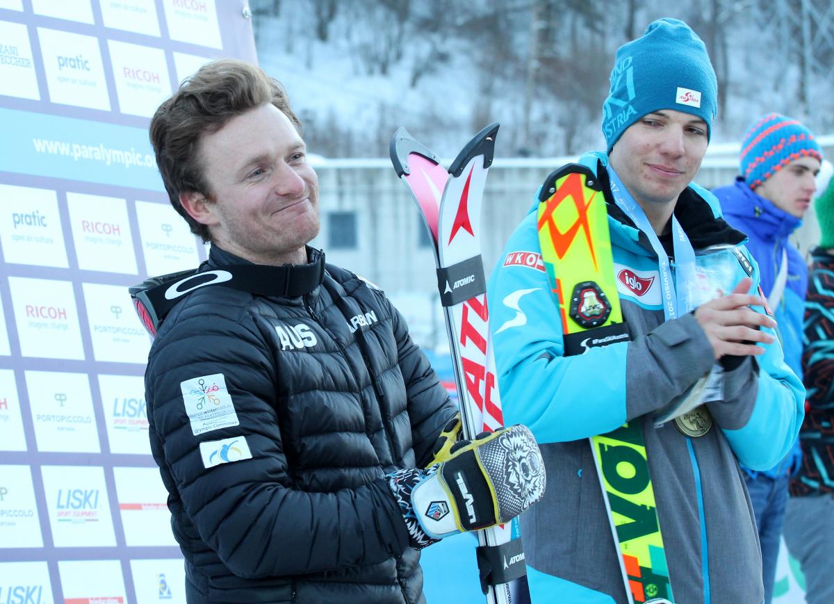 a Para skier smiles with his skies