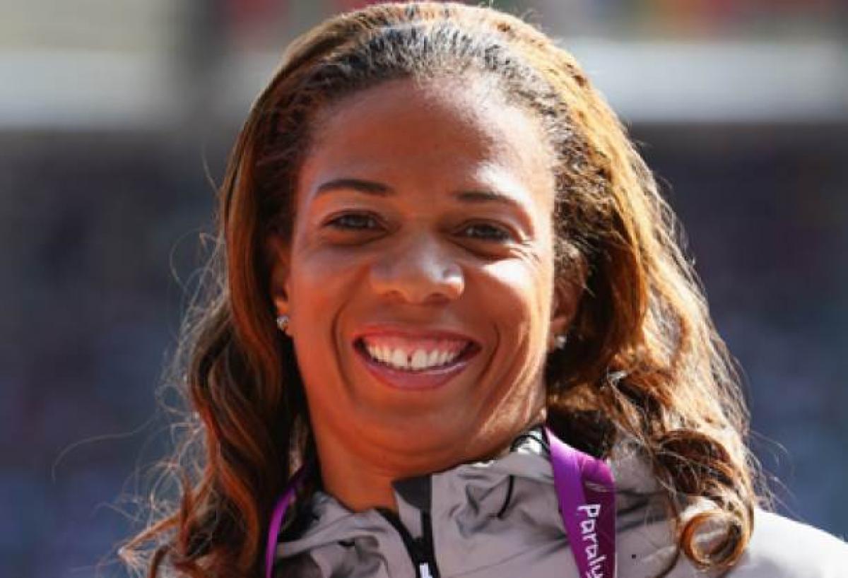 April Holmes A picture of a woman's portrait showing her bronze medal