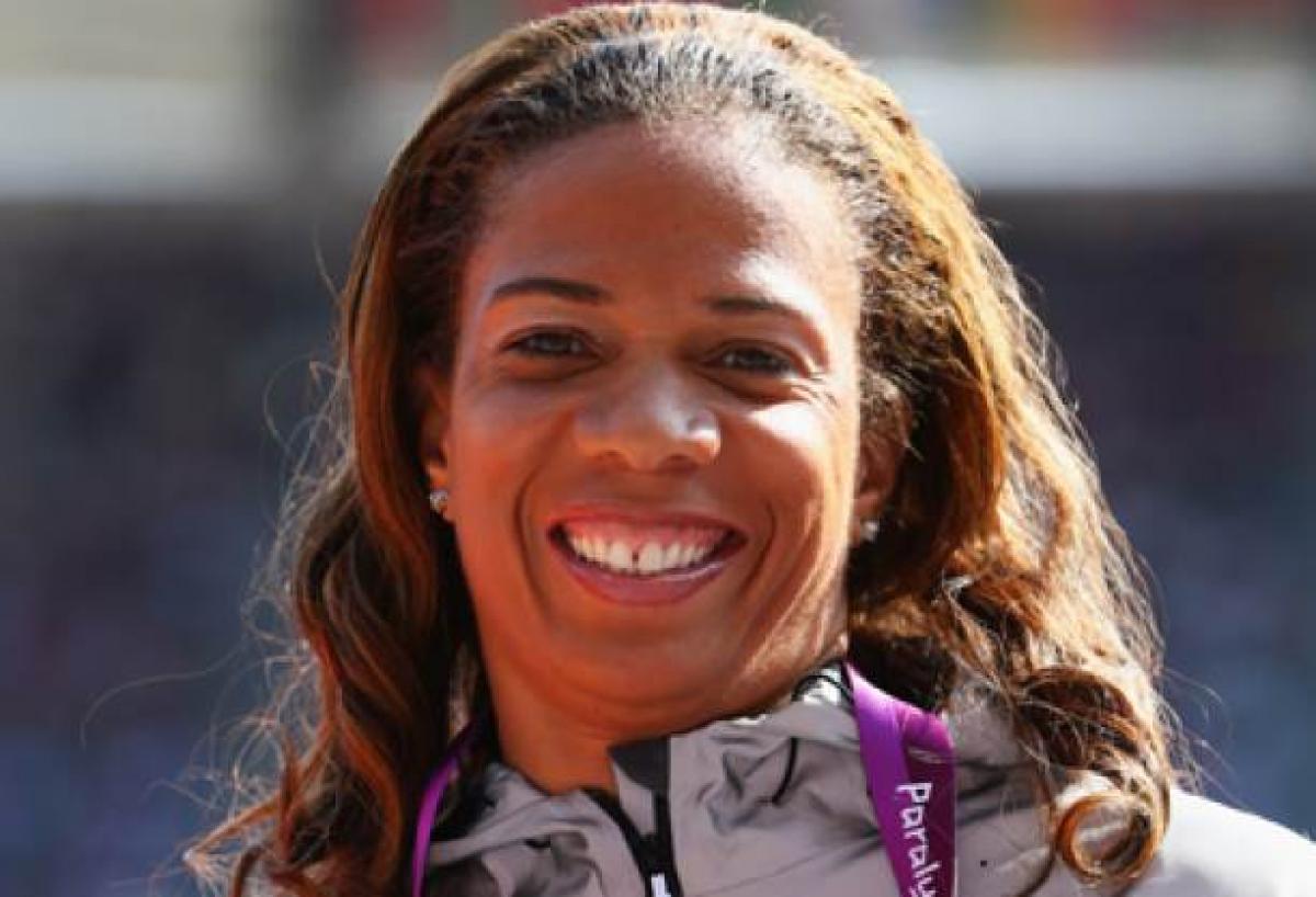 A picture of a woman's portrait showing her bronze medal