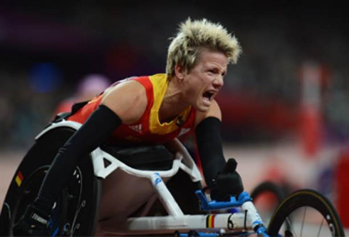 Marieke Vervoort A picture of a woman in a wheelchair screaming after her victory in an athletics race