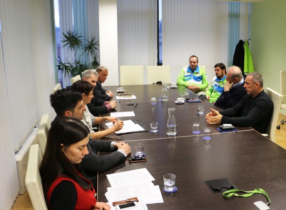 NPC Slovenia and government officials People in a meeting room around the table