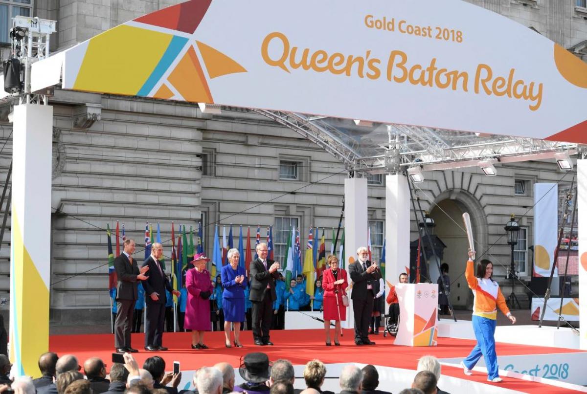 Retired cyclist Anna Mears from Australia carries the baton after receiving it from Queen Elizabeth during the launch of The Queen's Baton Relay for the XXI Commonwealth Games being held on the Gold Coast in 2018 at Buckingham Palace.