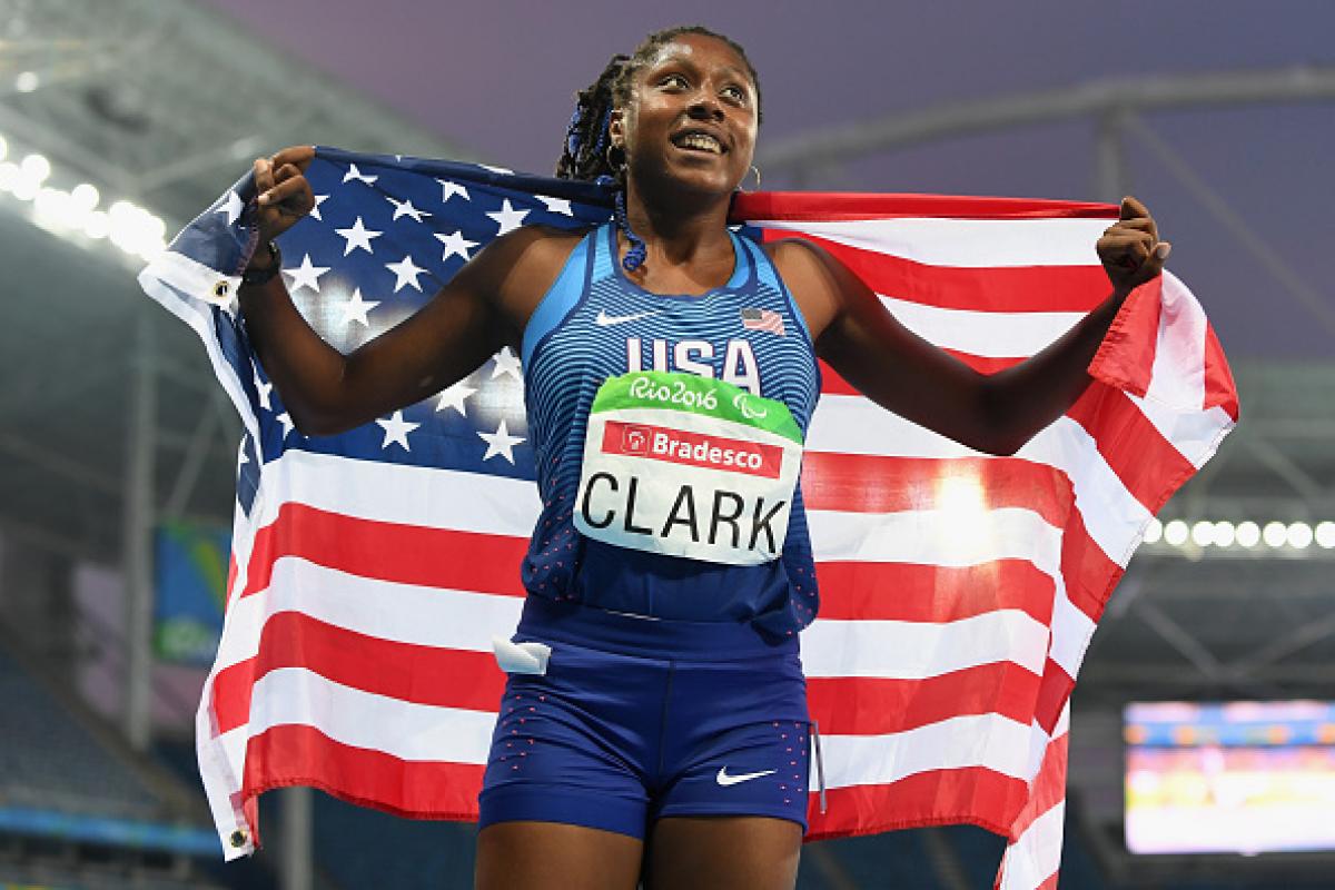 Breanna Clark of the United States celebrates winning the gold medal in the Women's 400m - T20 Final on day 6 of the Rio 2016 Paralympic Games