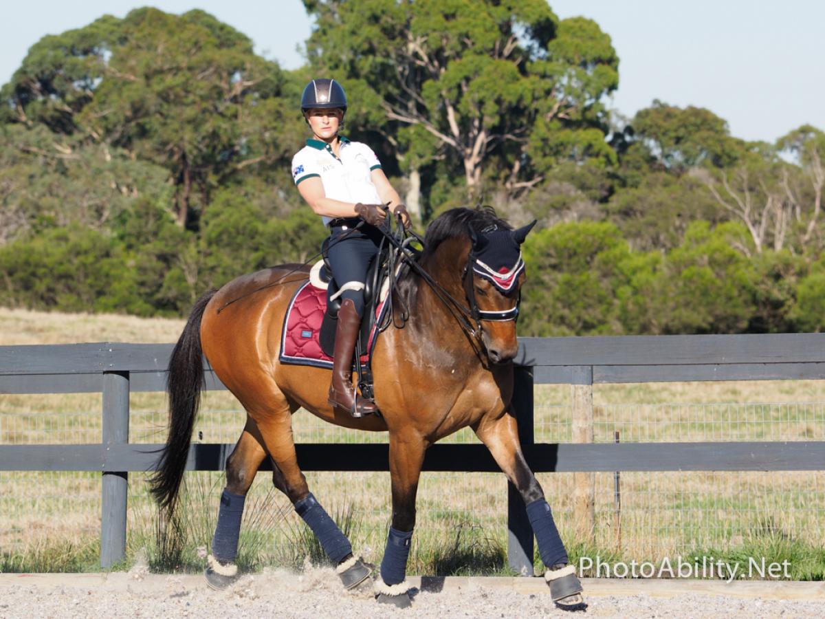 Woman riding a horse