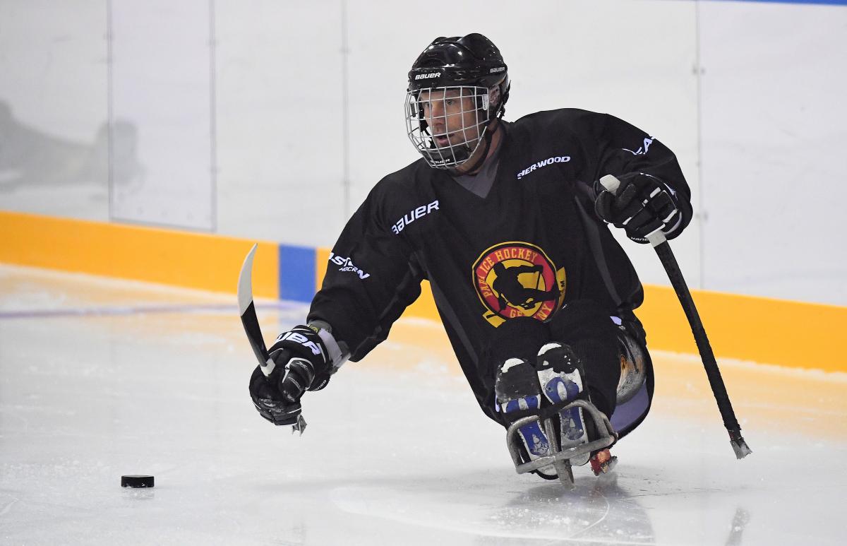 a Para ice hockey player on the ice