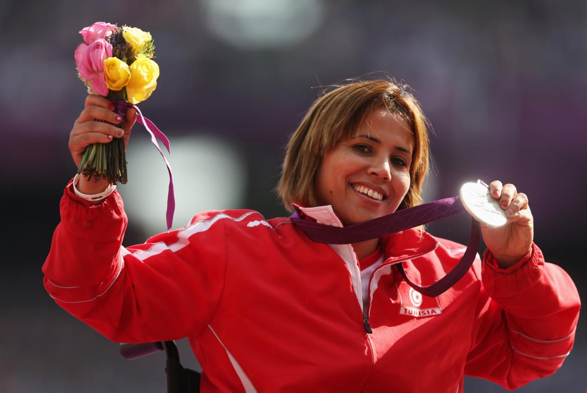 Hania Aidi Tunisia's silver medallist Hania Aidi on the podium during the medal ceremony for the women's javelin F54/55/56 at the London 2012 Paralympic Games.