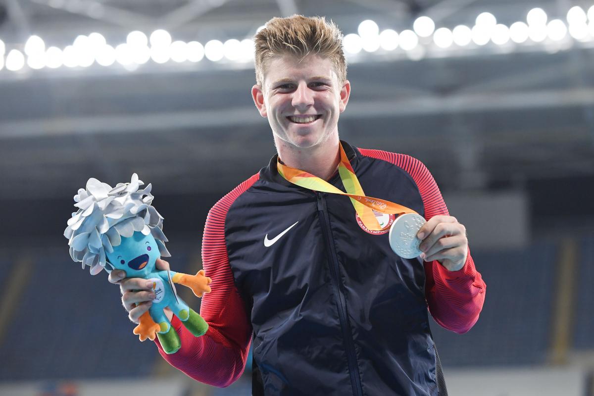 The USA's silver medallist Hunter Woodhall at the medal ceremony for the men's 200m T44 at the Rio 2016 Paralympic Games.