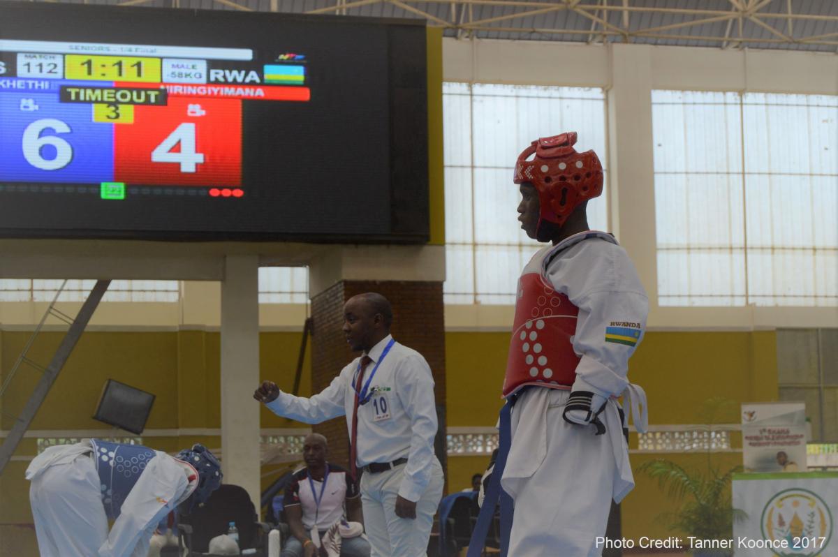 Jean Claude Niringiyimana - Rwanda taekwondo Man in taekwondo uniform at a competition