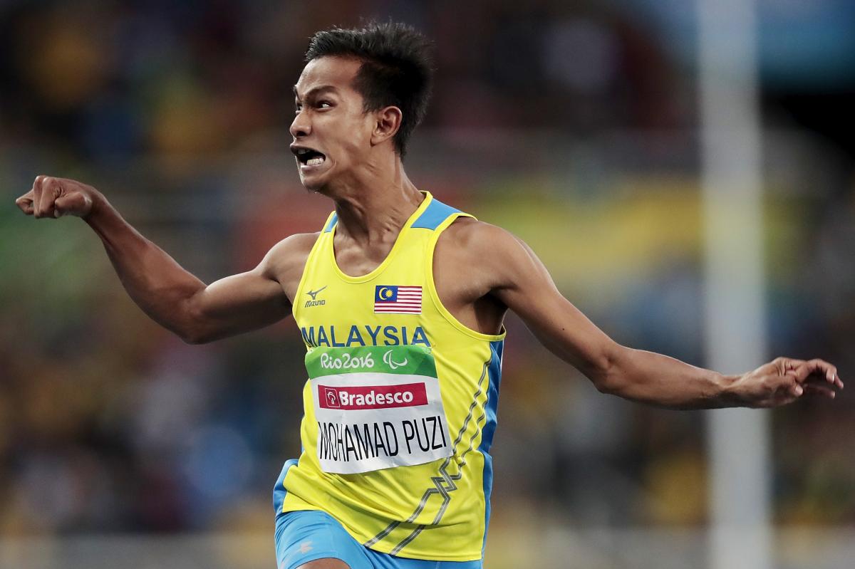 Malaysia's Mohamad Ridzuan Puzi reacts after victory in the men's 100m T36 final at the Rio 2016 Paralympic Games.