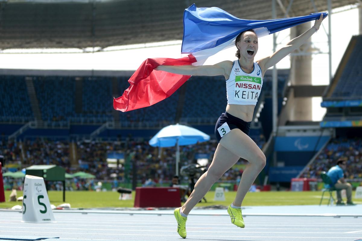 France's Nantenin Keita celebrates victory in the women's 400m T13 final at the Rio 2016 Paralympic Games.