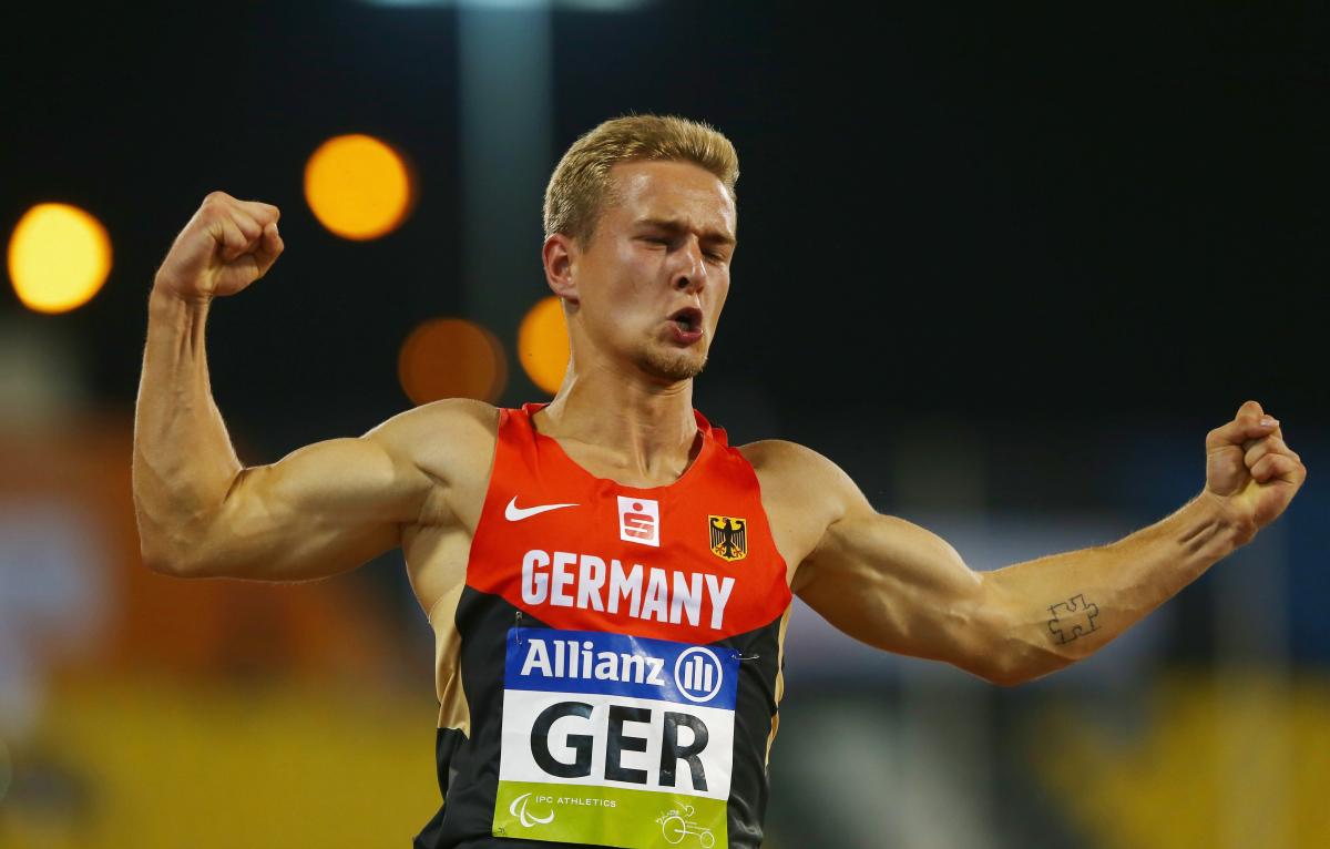 Germany's Johannes Floors celebrates winning the men's 4x100m T42-47 final during Doha 2015.