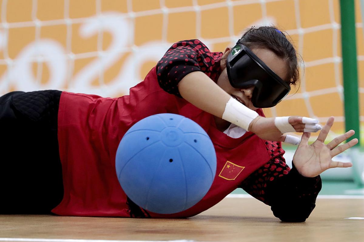 China's Fengqing Chen saves a goal in the Rio 2016 goalball competition 