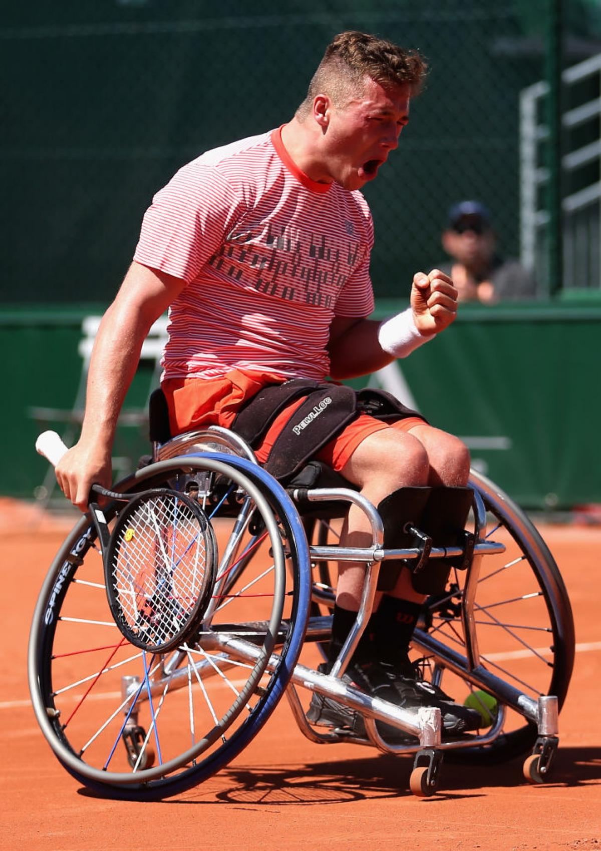 Alfie Hewett of Great Britain celebrates beating Argentina's Gustavo Fernandez in the mens singles wheelchair final at Roland Garros. 