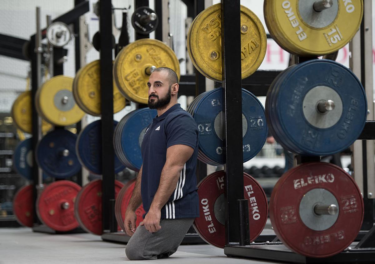 GB powerlifter Ali Jawad poses in weight room at Loughborough University