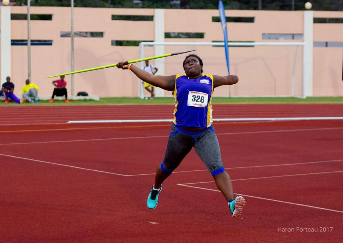 Ishona Charles competing woman throwing a javelin
