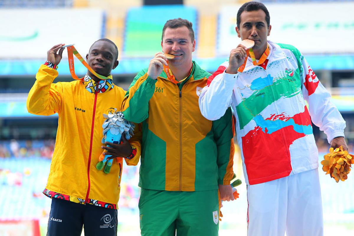 Luis Lucumi - Rio 2016 three men stand on a podium with their medals