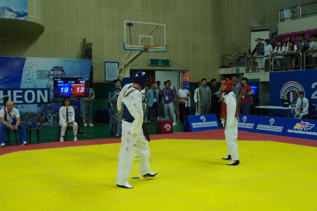 two Para taekwondo fighters prepare to fight