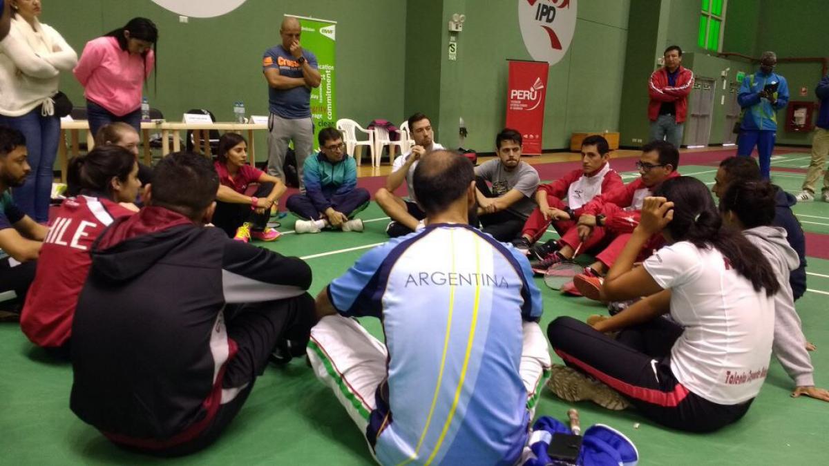 Proud Paralympian - Peru a group of para athletes sit having a group discussion