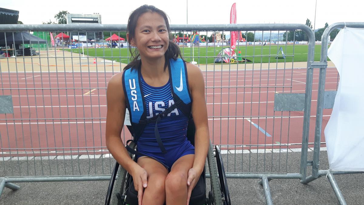 USA's Hannah Dederick Girl in wheelchair smiles for a photo after her race
