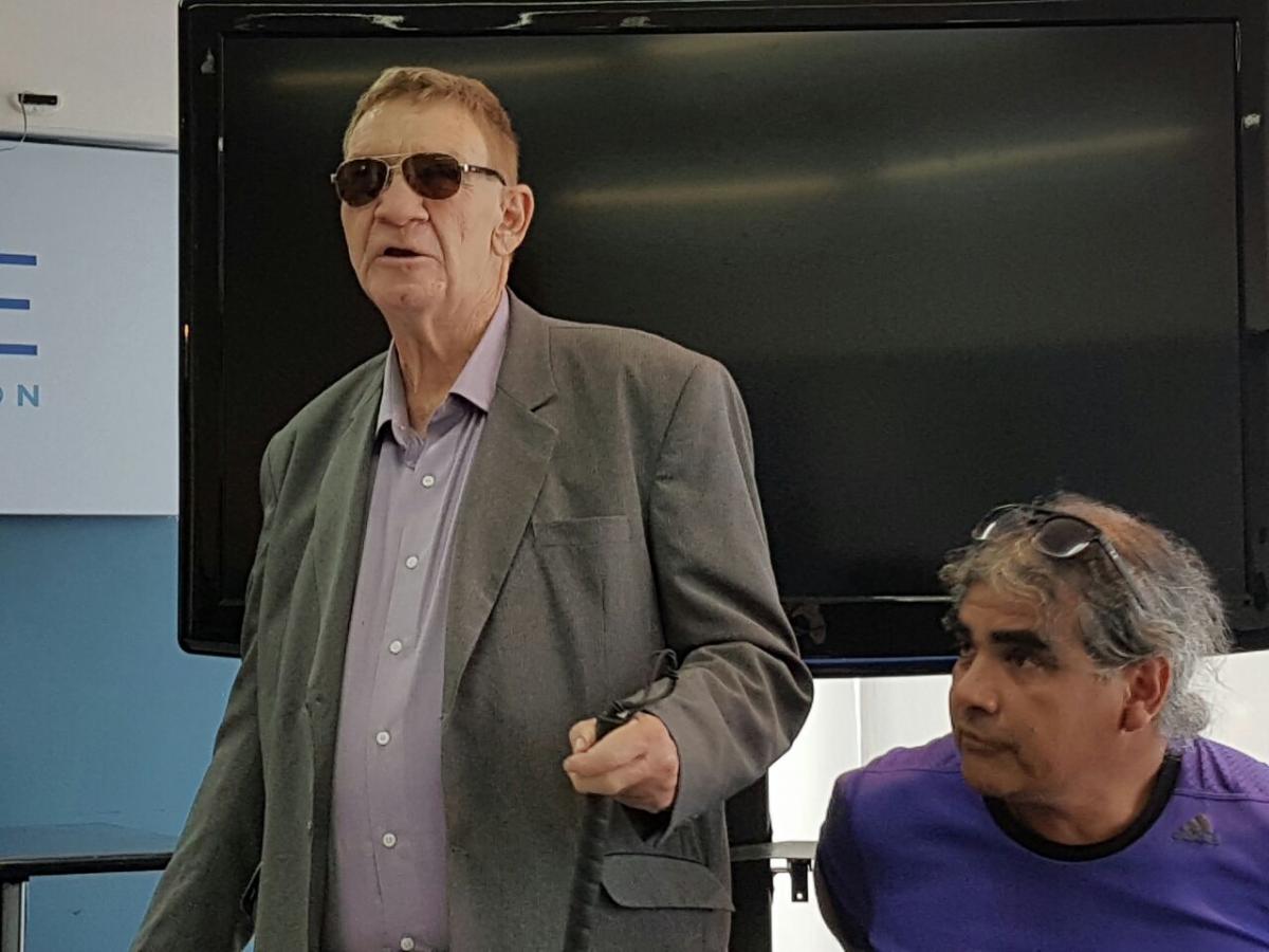NPC Argentina President Latela two men - one standing one sitting