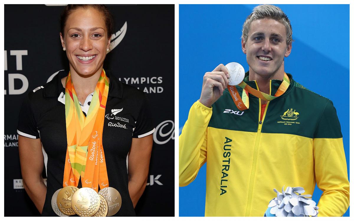 A male and a female swimmer pose with their medals