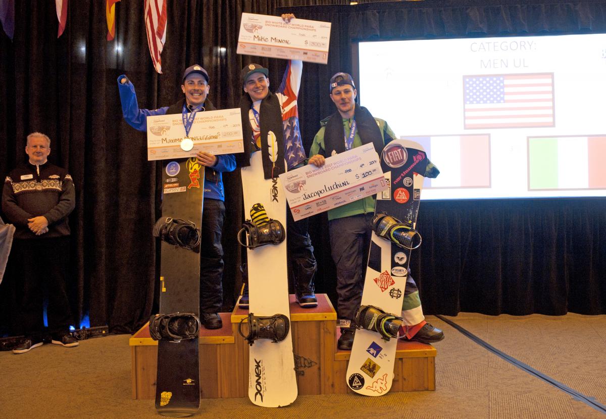Mike Minor, Maxime Montaggioni, Jacopo Luchini - snowboard Three male snowboarders on the podium