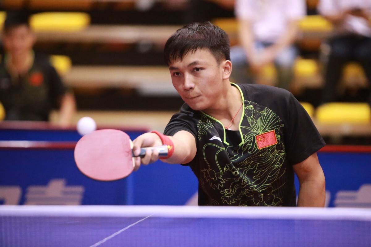 A Para table tennis player takes a shot