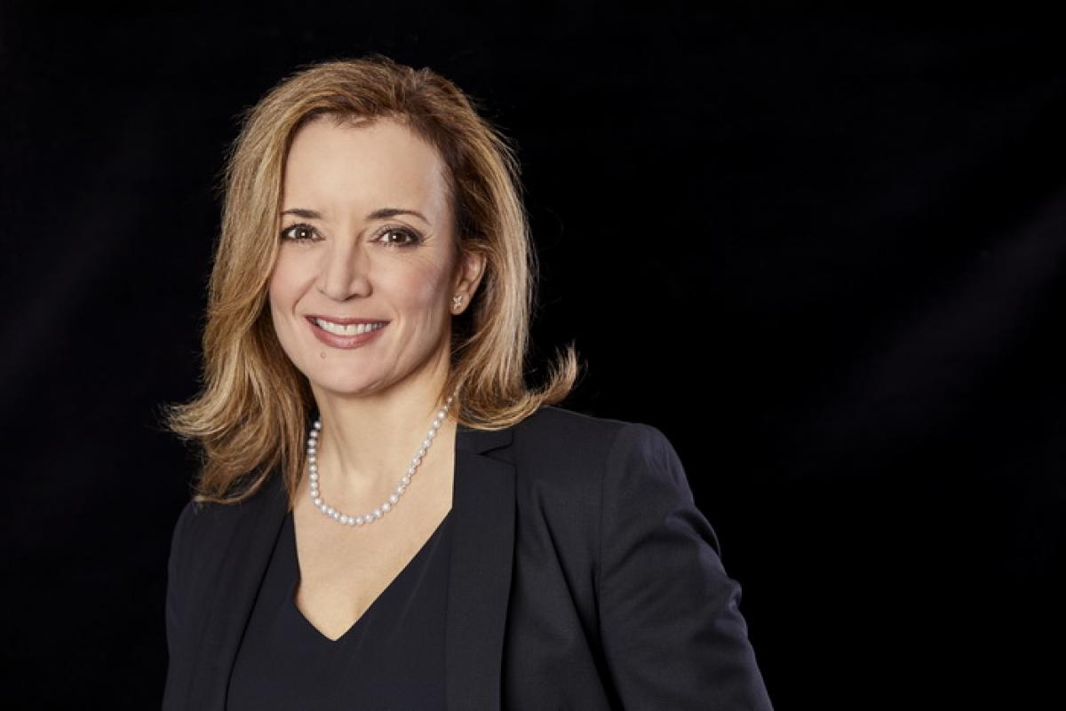 Sabrina Ibanez - APSO President a woman smiles for the camera