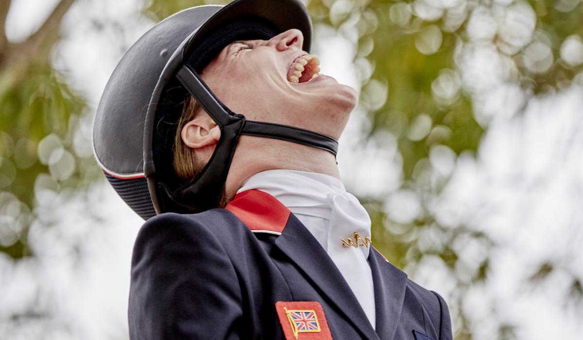 a Para equestrian rider laughing