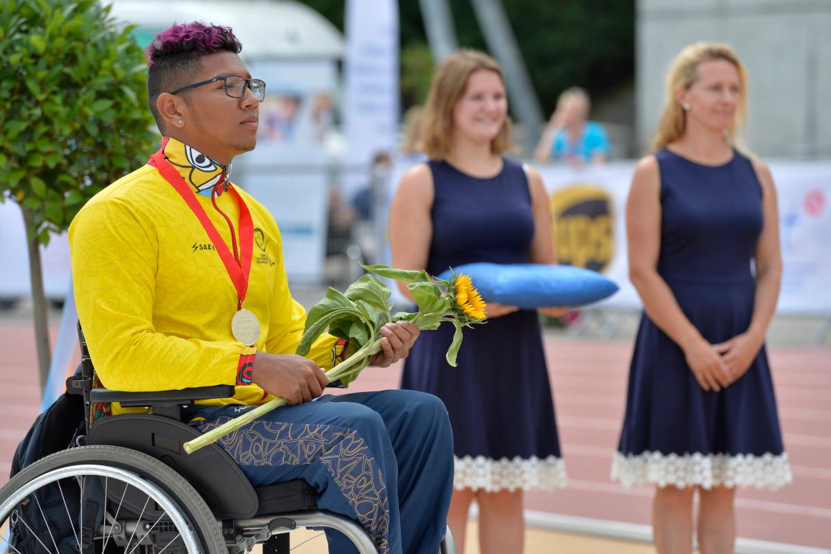 a male Para athlete during a medal ceremony