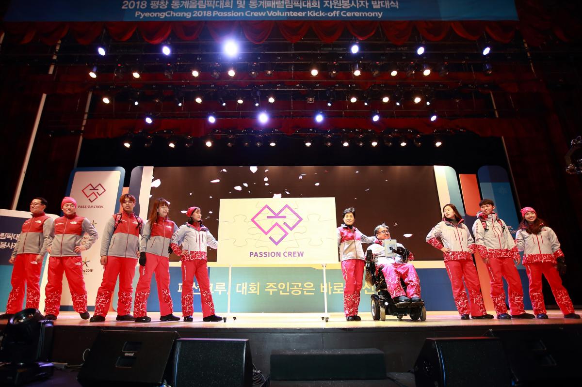 PyeongChang 2018 Passion Crew kit launch a group of people model outfits on a stage