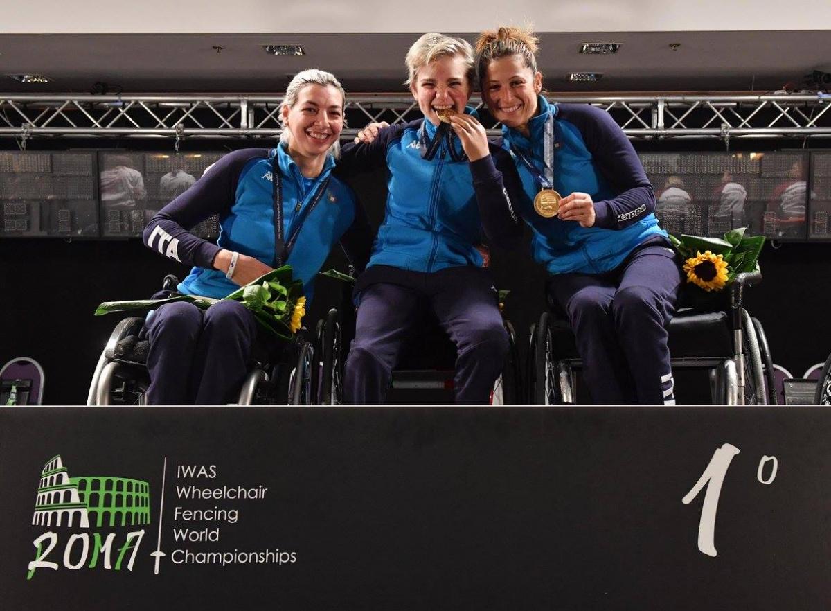 Italy's women celebrate foil gold at the 2017 IWAS Wheelchair Fencing World Championships.