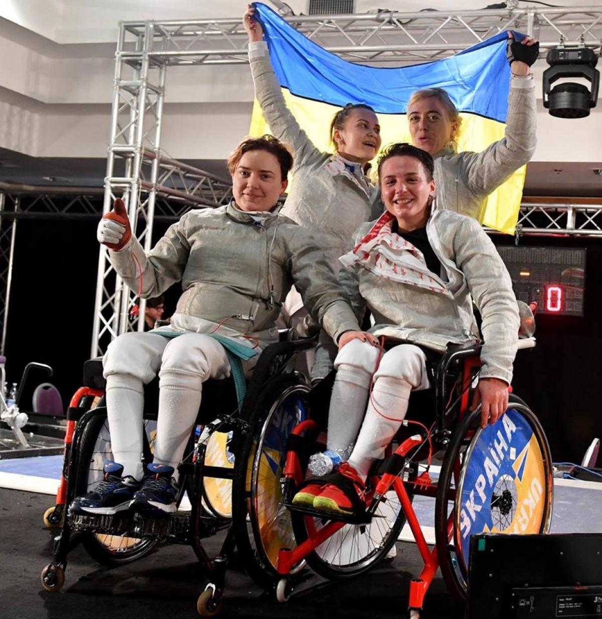 Ukraine's women celebrate the defence of their sabre team world title in Rome, Italy.