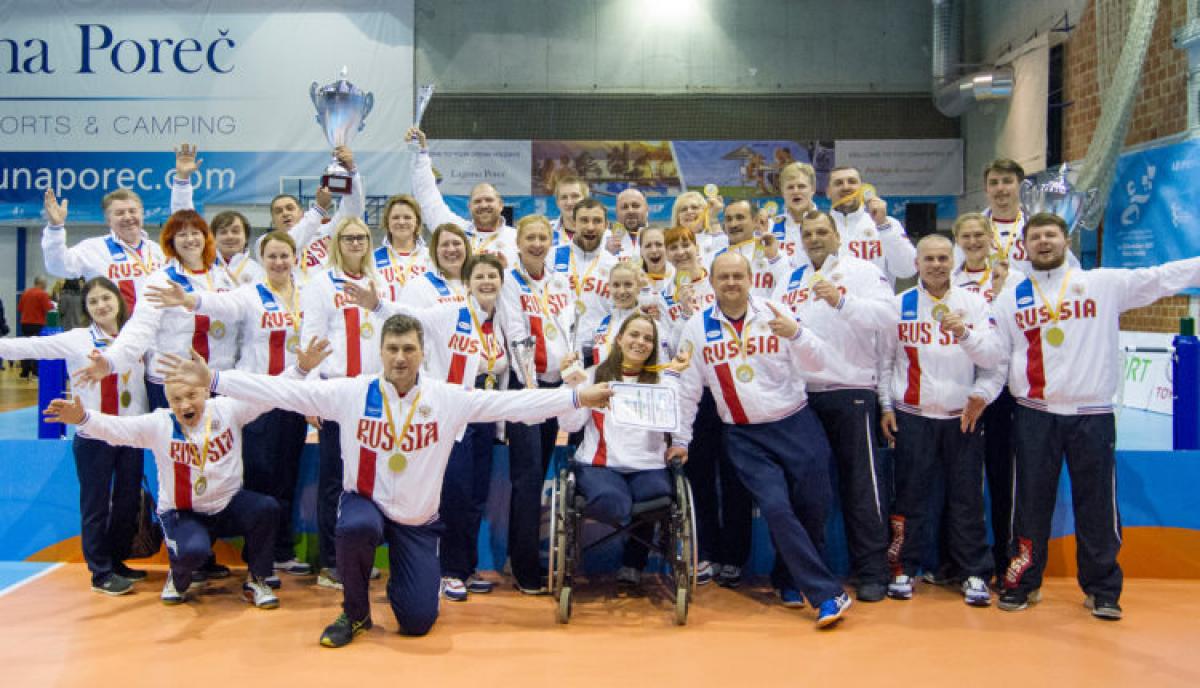 Russia sitting volleyball European champions a group of male and female sitting volleyball players celebrate
